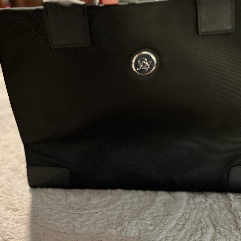 Joy Mangano travel bag.  New never used.  Black cloth sturdy